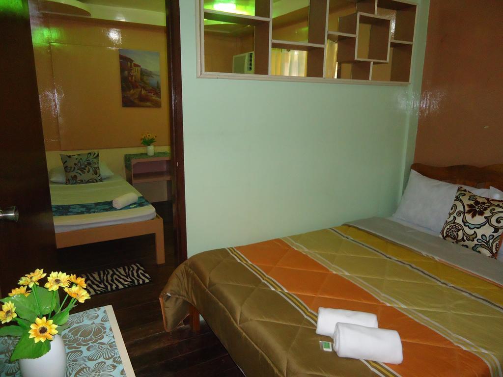 Villa Travelista Travel Lodge Puerto Princesa Quarto foto